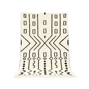 Zahira - Tapis berbère marocain en laine, motifs traditionnels noirs et blancs. - Product Image